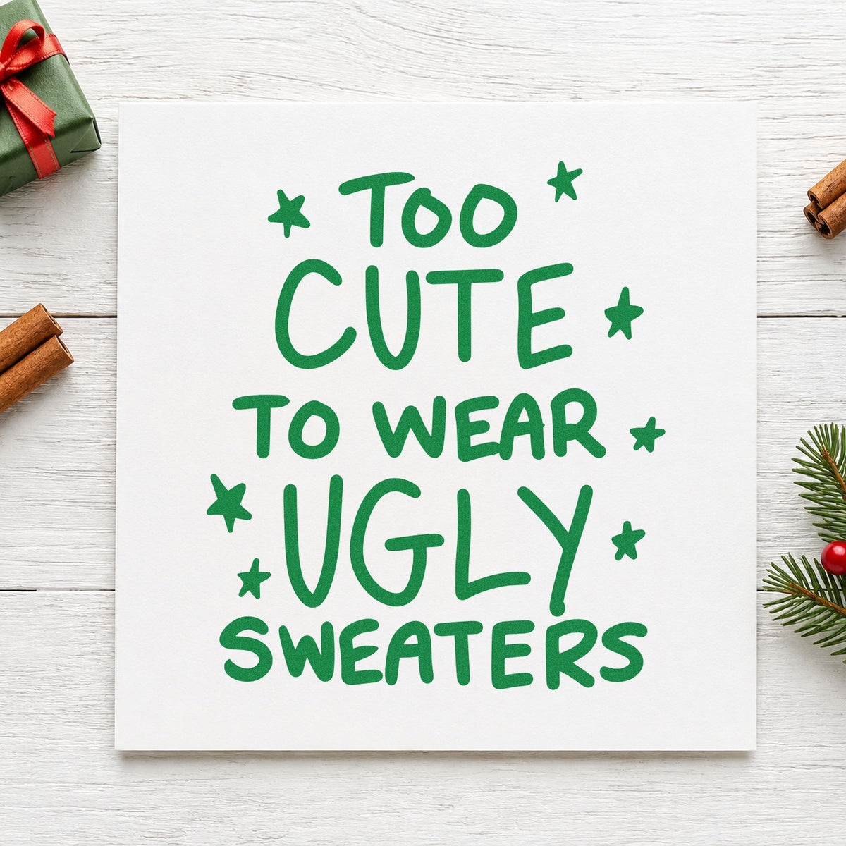 Too Cute Ugly Sweaters craft stamp imprint in green ink on a handmade project, one idea being boutique bag tags.