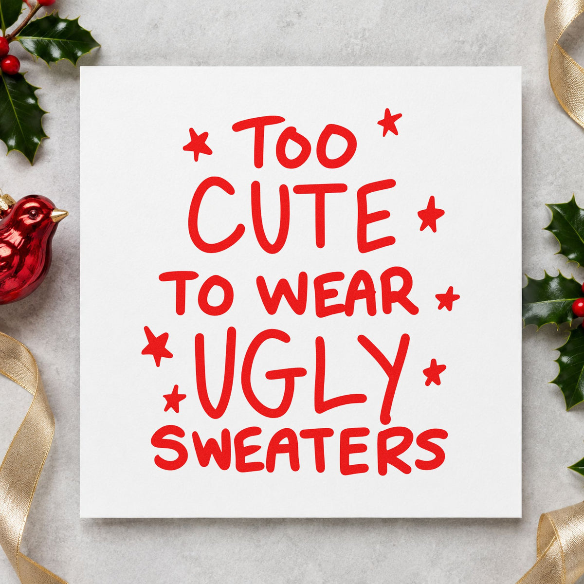Too Cute Ugly Sweaters craft stamp in red ink on cardstock, an easy option for tote panel printing.