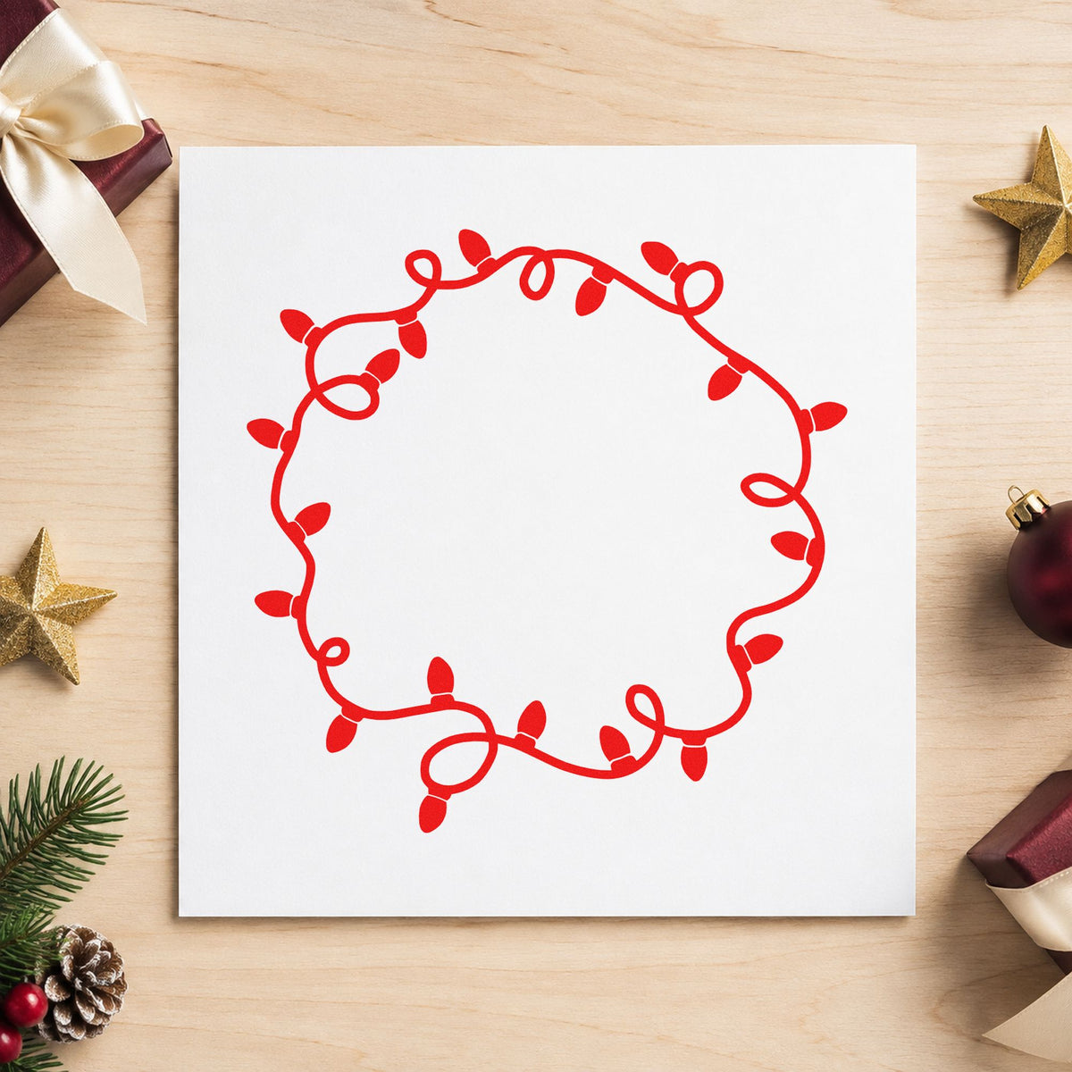 Circular Christmas Light Border craft stamp in red ink on cardstock, an easy option for napkin ring printing.