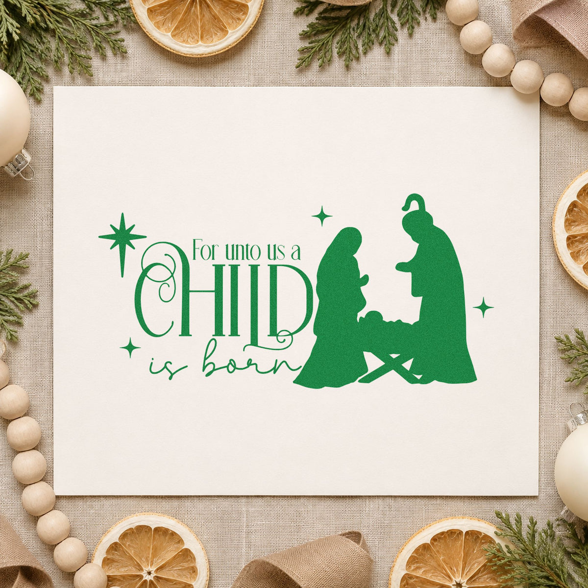 Unto Us Child Is Born craft stamp imprint in green ink on a handmade project, one idea being nativity set tags.