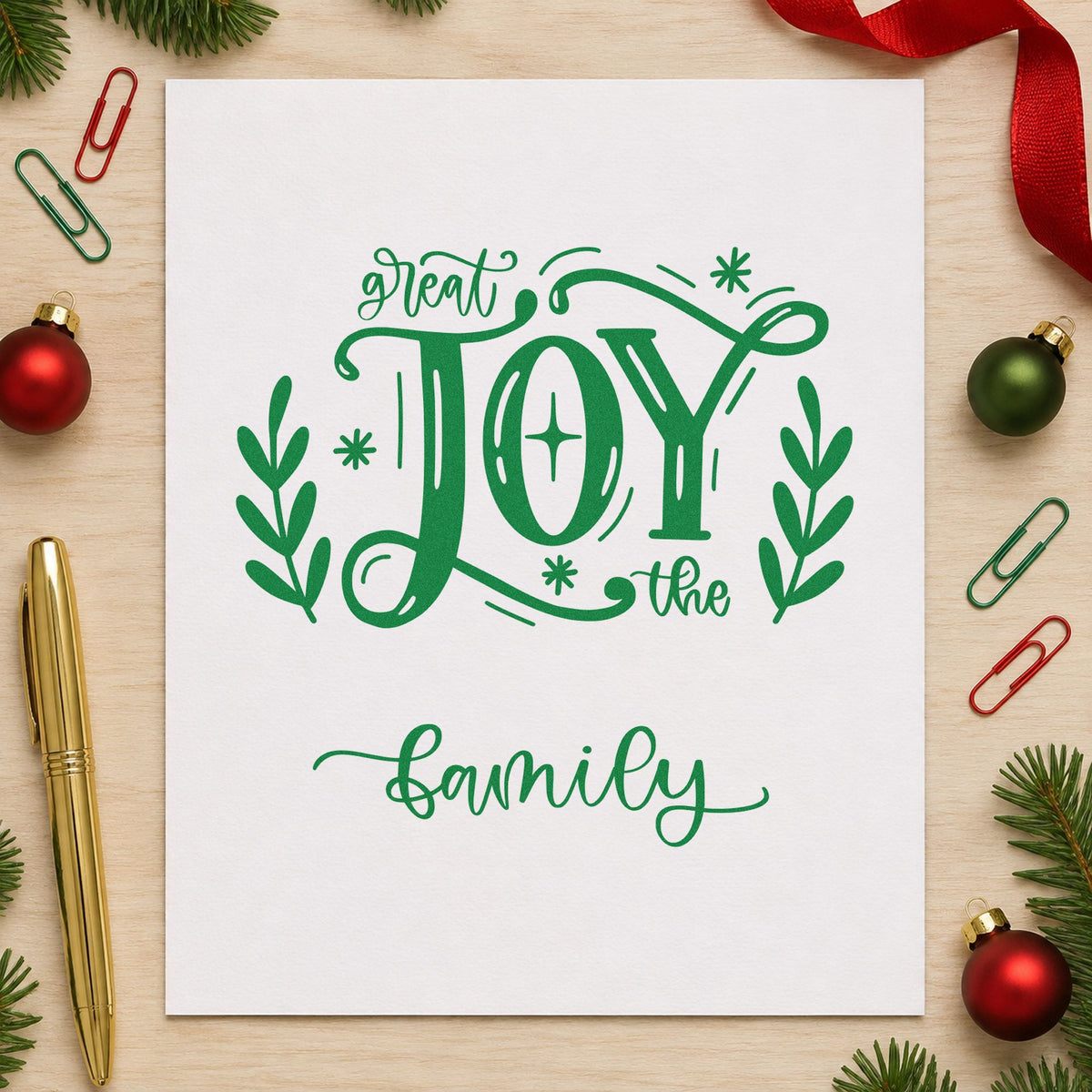 Great Joy To The Family craft stamp imprint in green ink on a handmade project, one idea being grandparent gift tags.