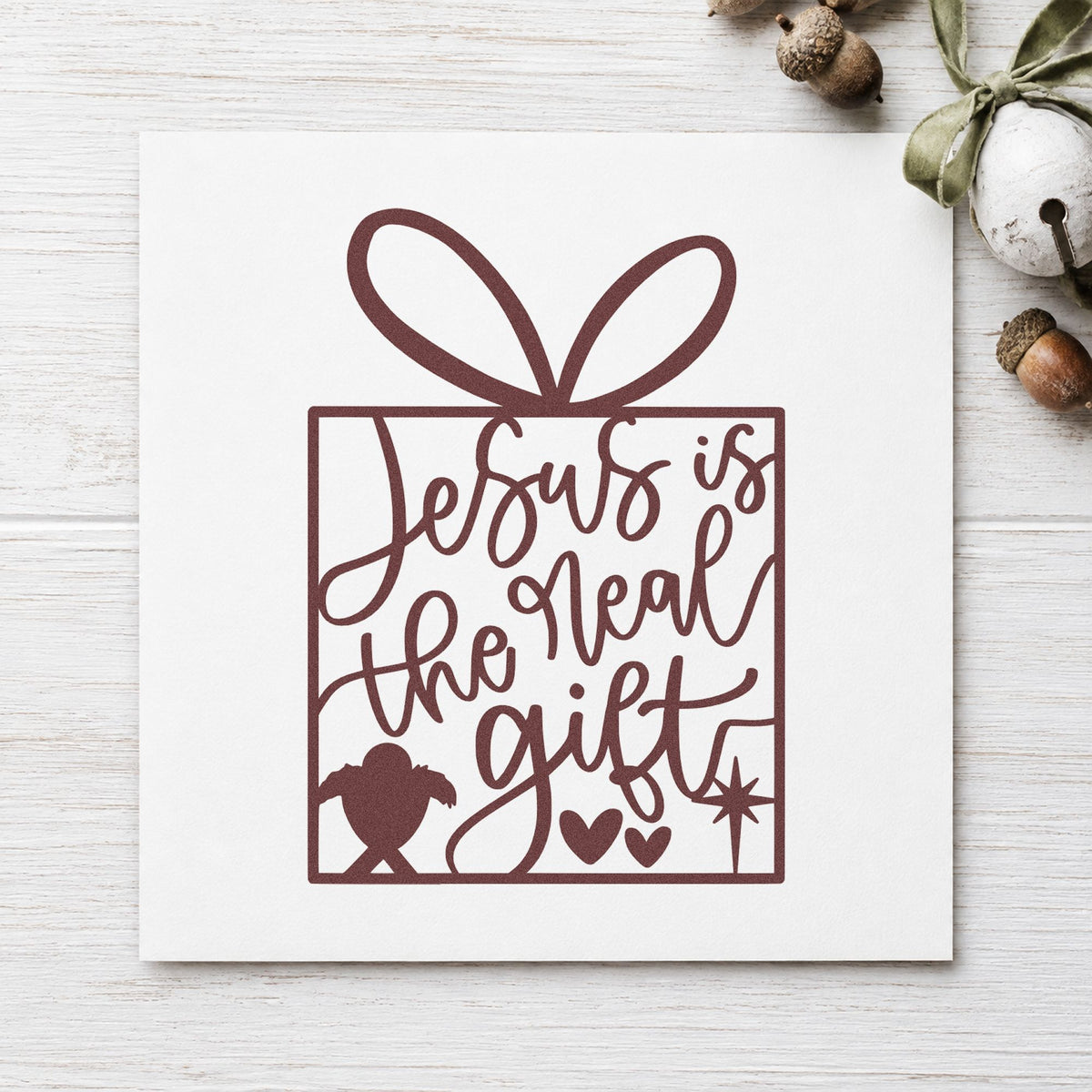 Jesus Is The Real Gift rubber stamp printed in brown ink, ready for lesson outline sheet and similar paper crafts.