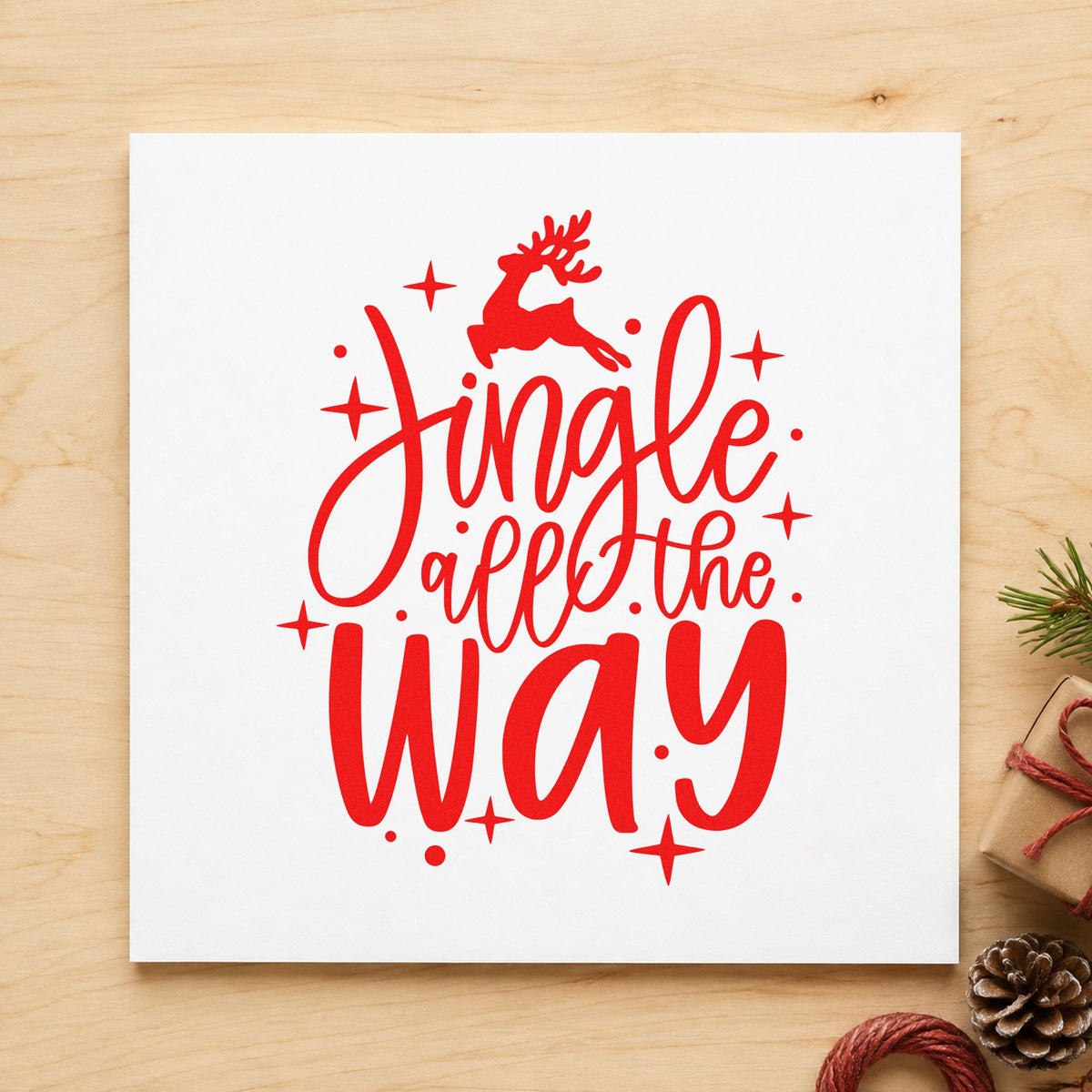 Jingle All The Way Reindeer craft stamp in red ink on cardstock, an easy option for gym pinnie printing.