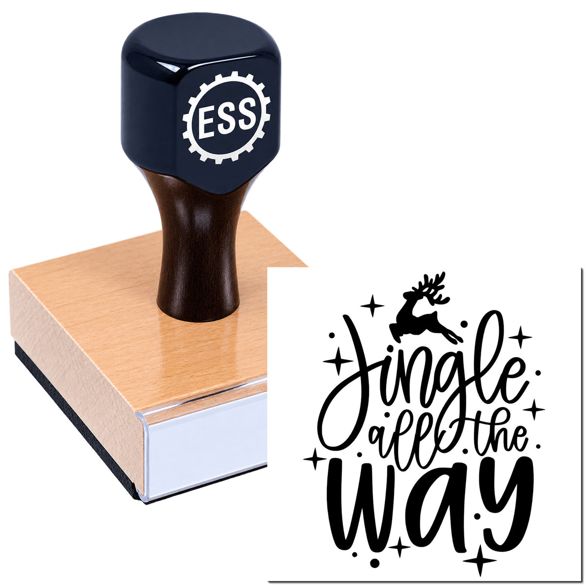 Black ESS rubber stamp on wooden base with festive seal reading "Jingle all the way" and reindeer.