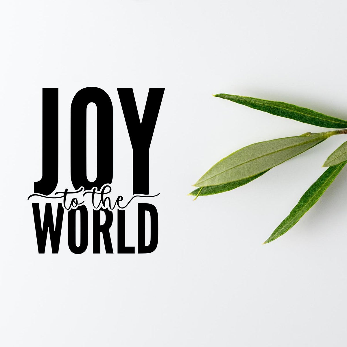 Black Joy to the World decorative stamp seal with green leaves on a white background.