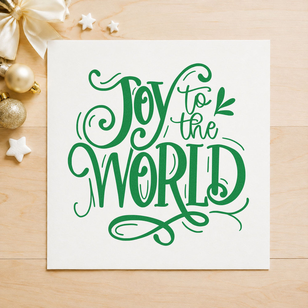 Joy To The World Ornate craft stamp imprint in green ink on a handmade project, one idea being carol concert programs.