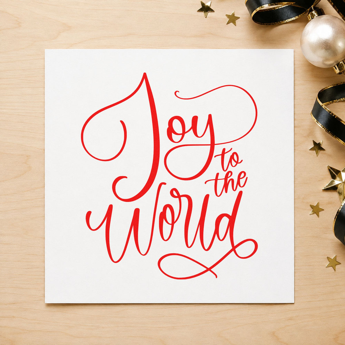 Joy To The World Thin Script craft stamp in red ink on cardstock, an easy option for silk scarf printing.