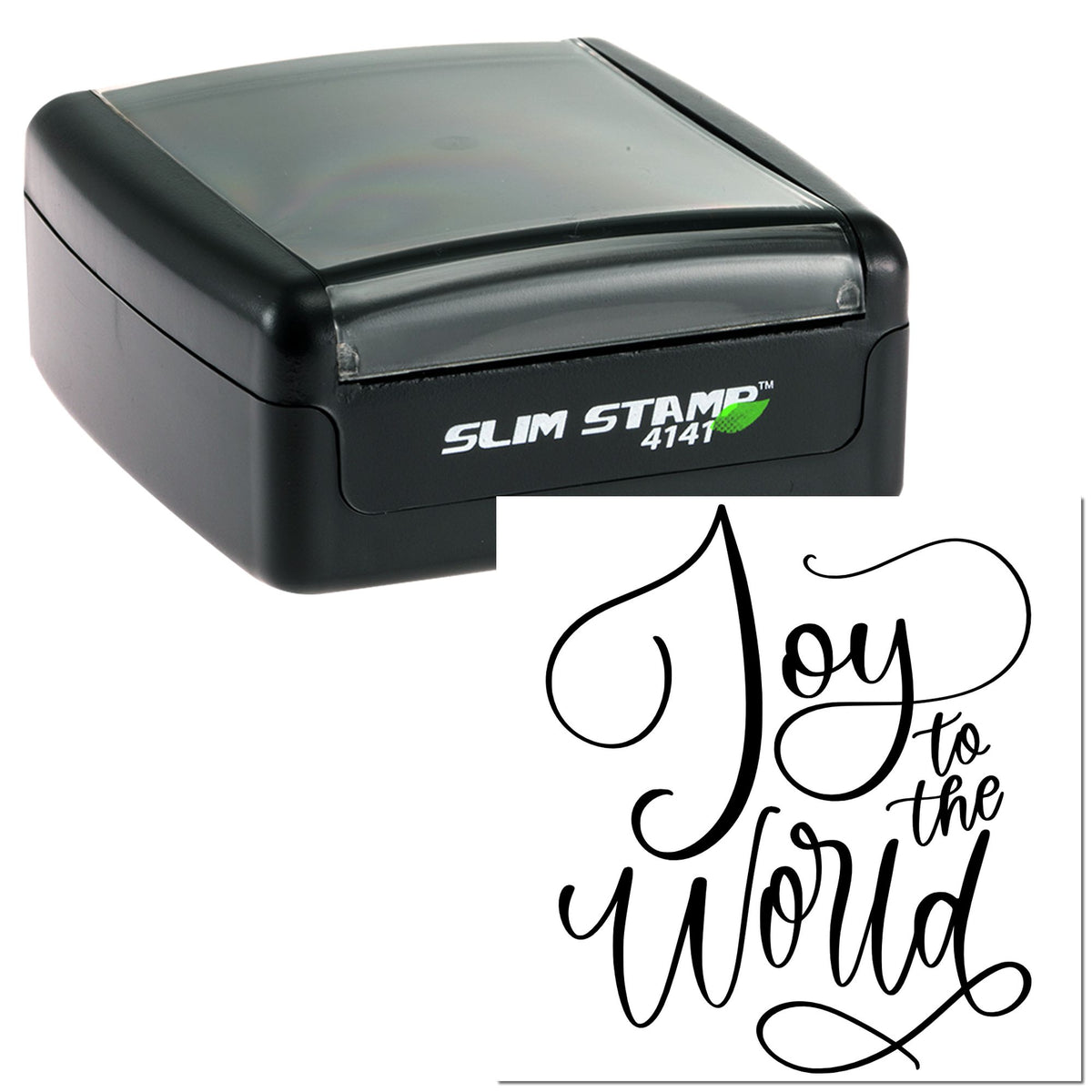 Black Slim Stamp 4141 self-inking stamp with clear cover beside a black script seal reading Joy to the World on white.