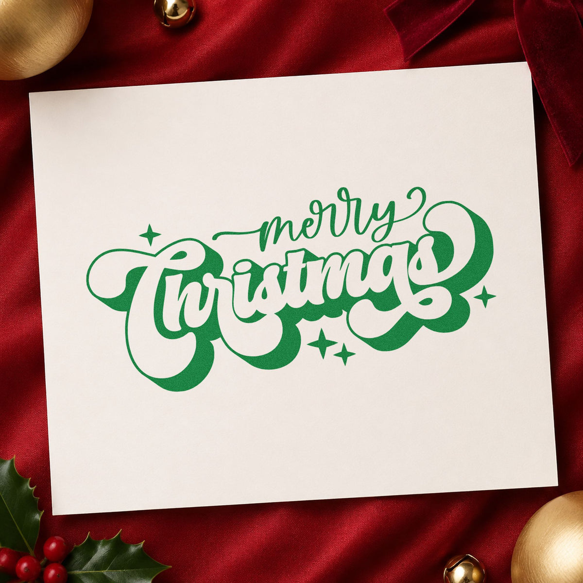 Merry Christmas Shadow Script craft stamp imprinted in green ink on paper, a design suited to framed writing desk.