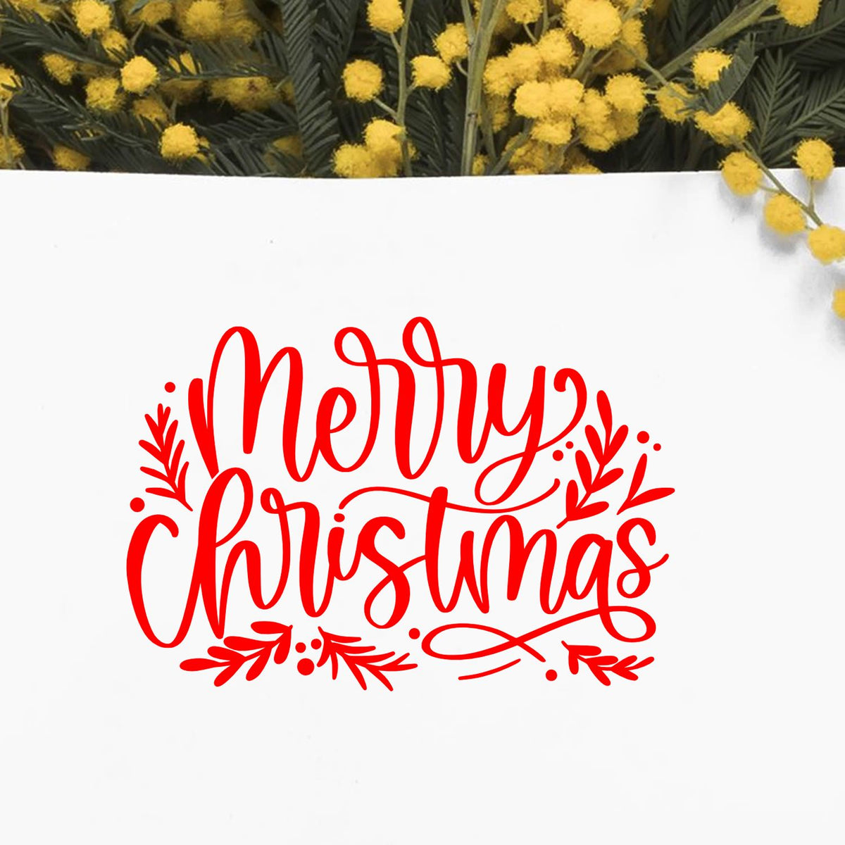 Red Merry Christmas stamp and seal design with leaf accents on white, framed by yellow flowers.