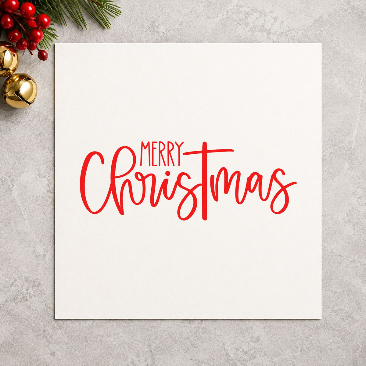 Merry Christmas Narrow Script rubber stamp shown in red ink, stamped for projects such as spine label strips.