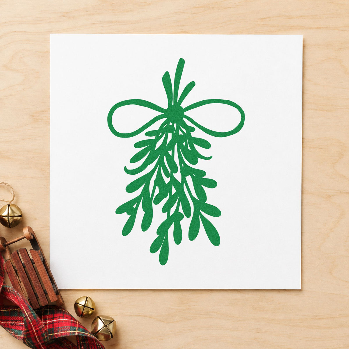 Mistletoe Bundle With Bow craft stamp imprinted in green ink on paper, a design suited to framed botanical trio.