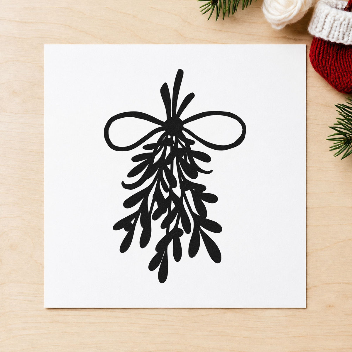 Mistletoe Bundle With Bow rubber stamp printed in black ink, ready for bundle motif cards and similar paper crafts.