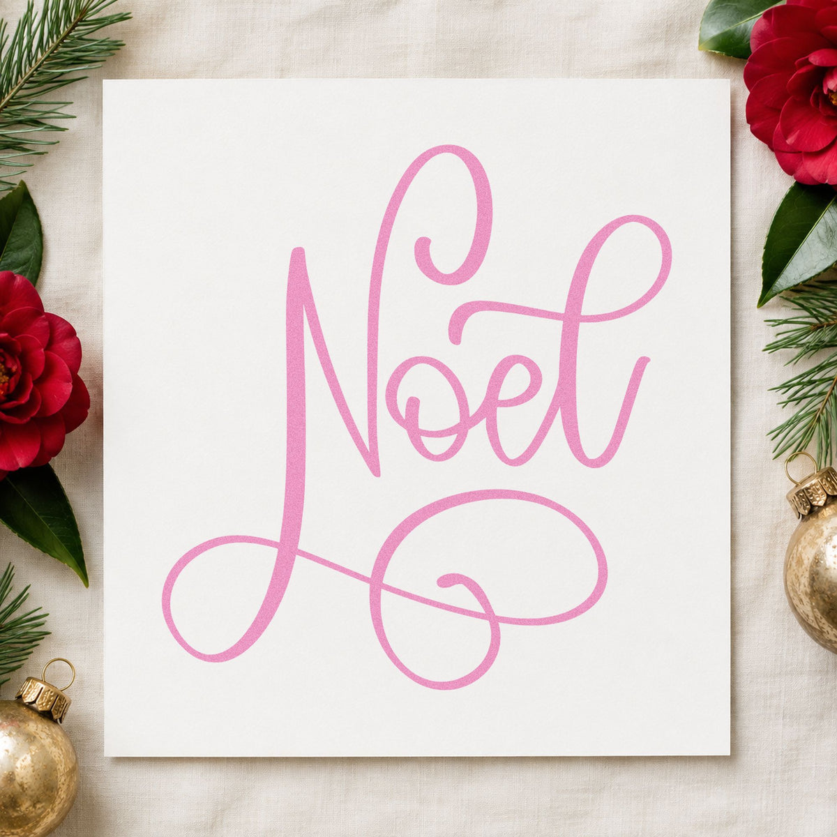 Noel Flowing Script craft stamp in purple ink on cardstock, an easy option for album cover plate.
