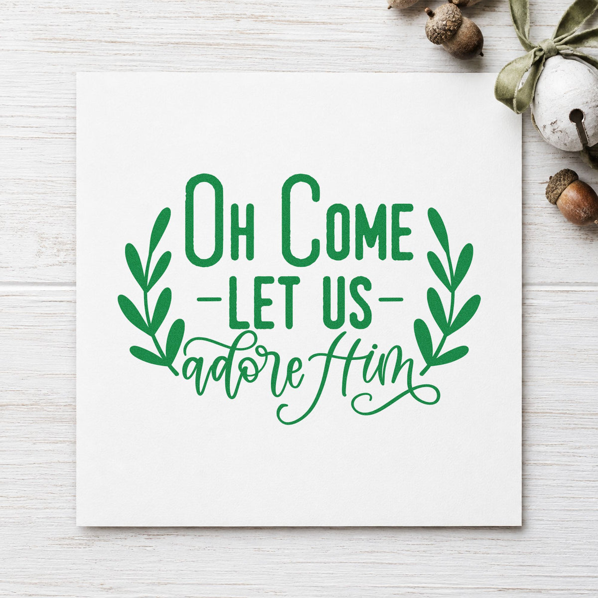 Oh Come Let Us Adore Him craft stamp imprint in green ink on a handmade project, one idea being devotional gift tags.