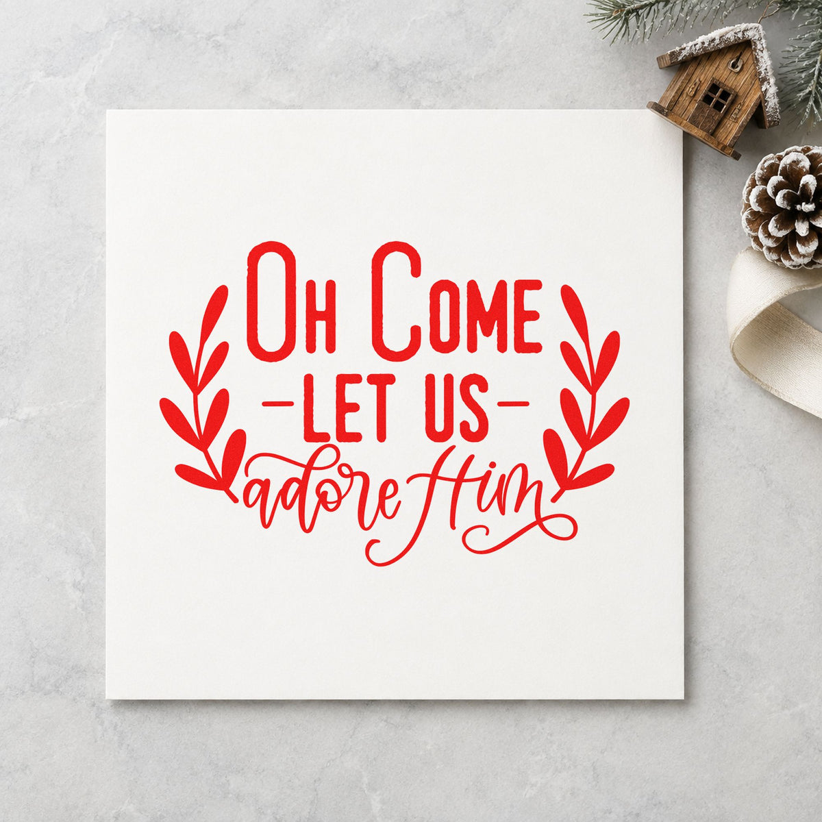 Oh Come Let Us Adore Him craft stamp in red ink on cardstock, an easy option for communion cloth ink.