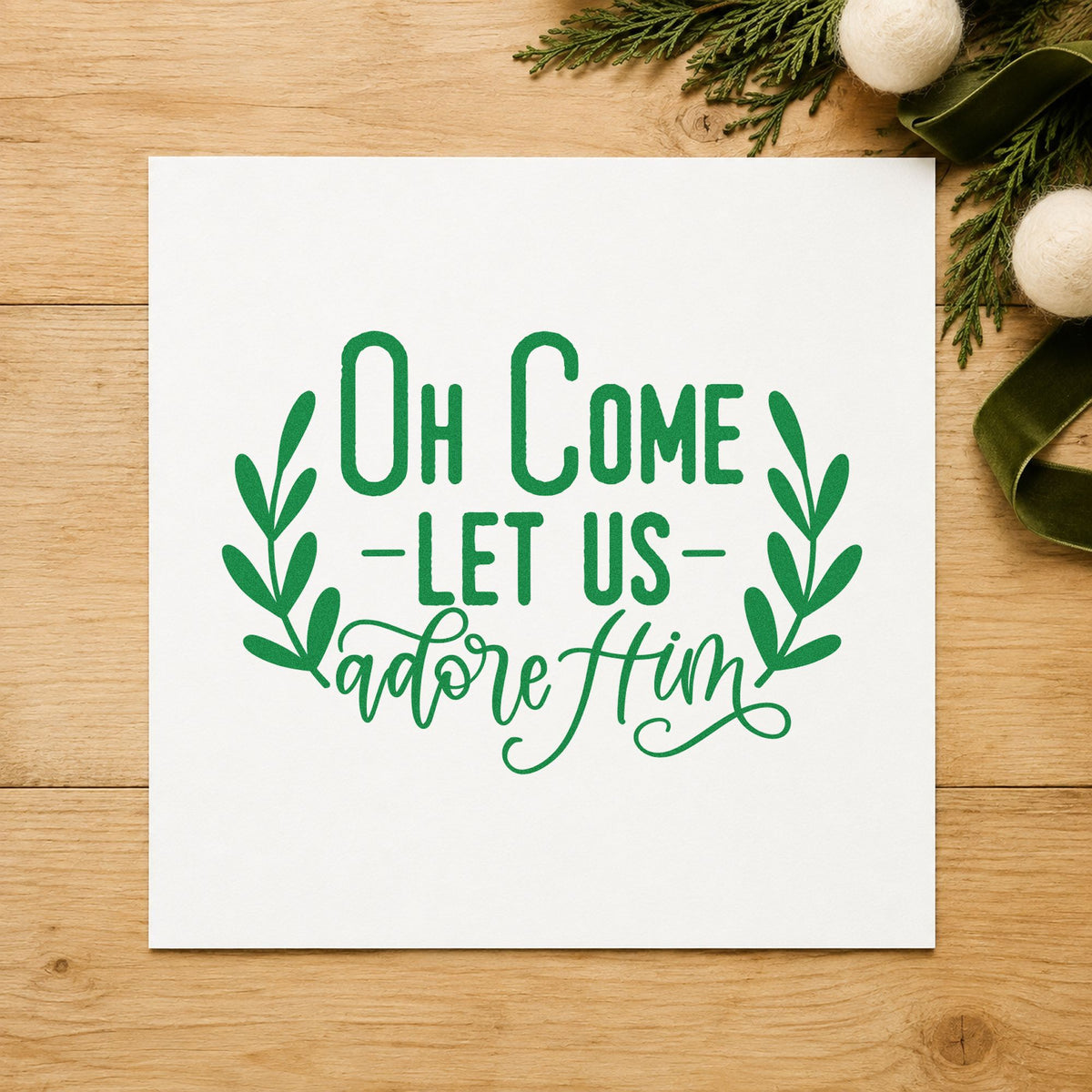 Oh Come Let Us Adore Him craft stamp imprinted in green ink on paper, a design suited to framed study corner.