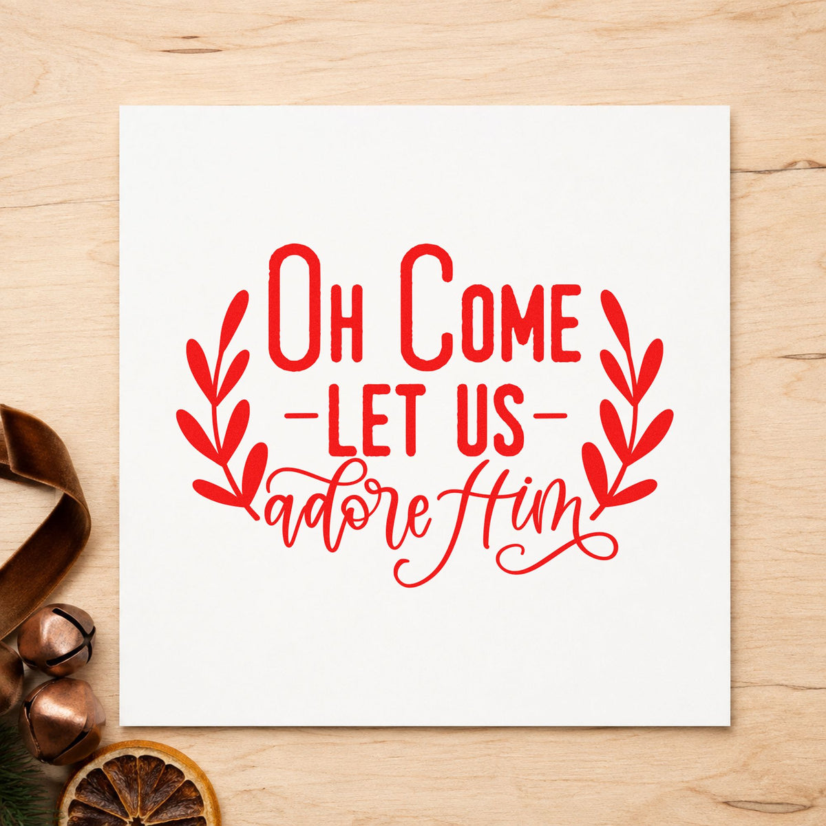 Oh Come Let Us Adore Him rubber stamp shown in red ink, stamped for projects such as study packet seals.