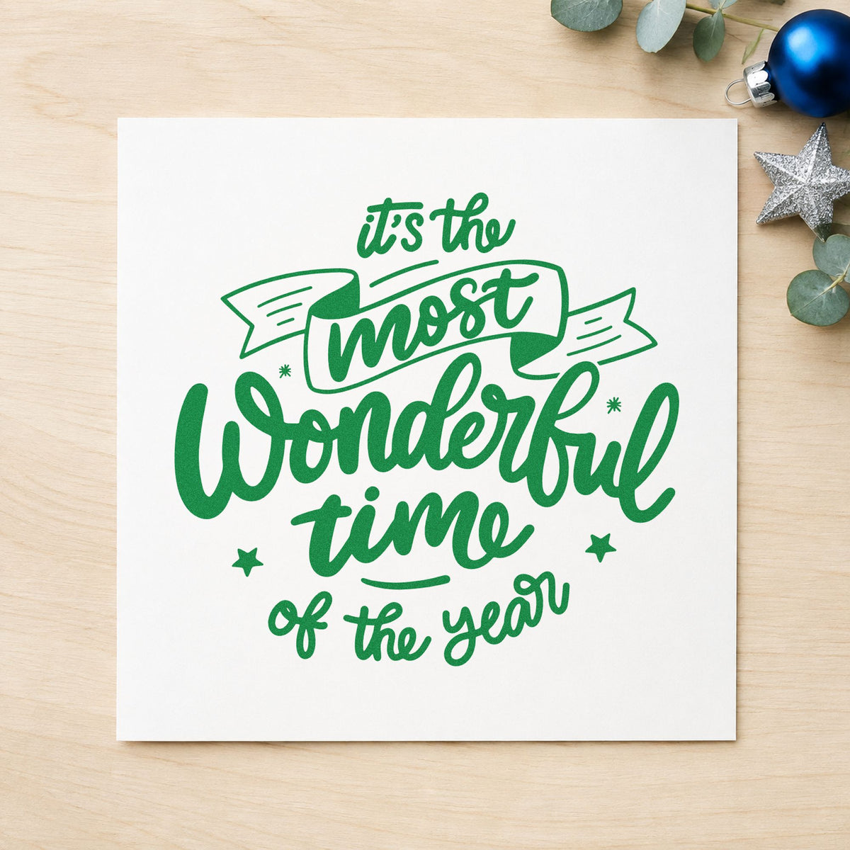 Most Wonderful Time Of Year craft stamp imprint in green ink on a handmade project, one idea being teacher gift tags.
