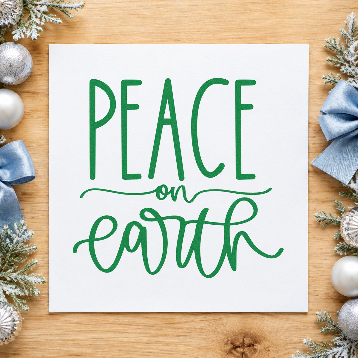 Peace On Earth Script craft stamp imprinted in green ink on paper, a design suited to framed studio entry.