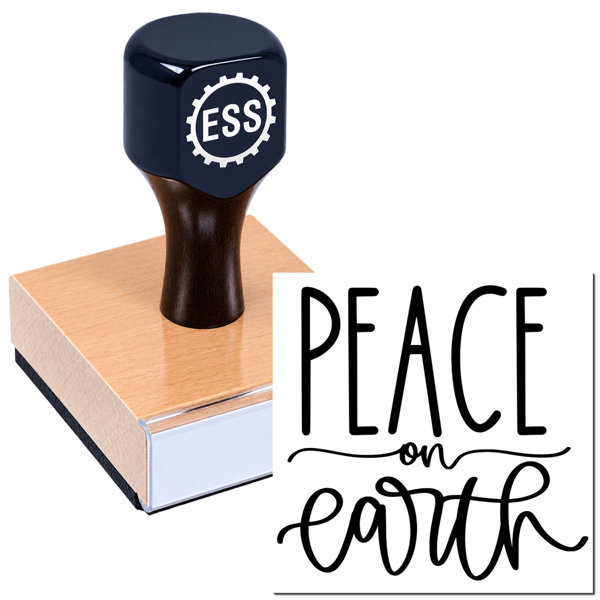 Navy ESS rubber stamp seal on a wooden block beside black "Peace on Earth" script on white.