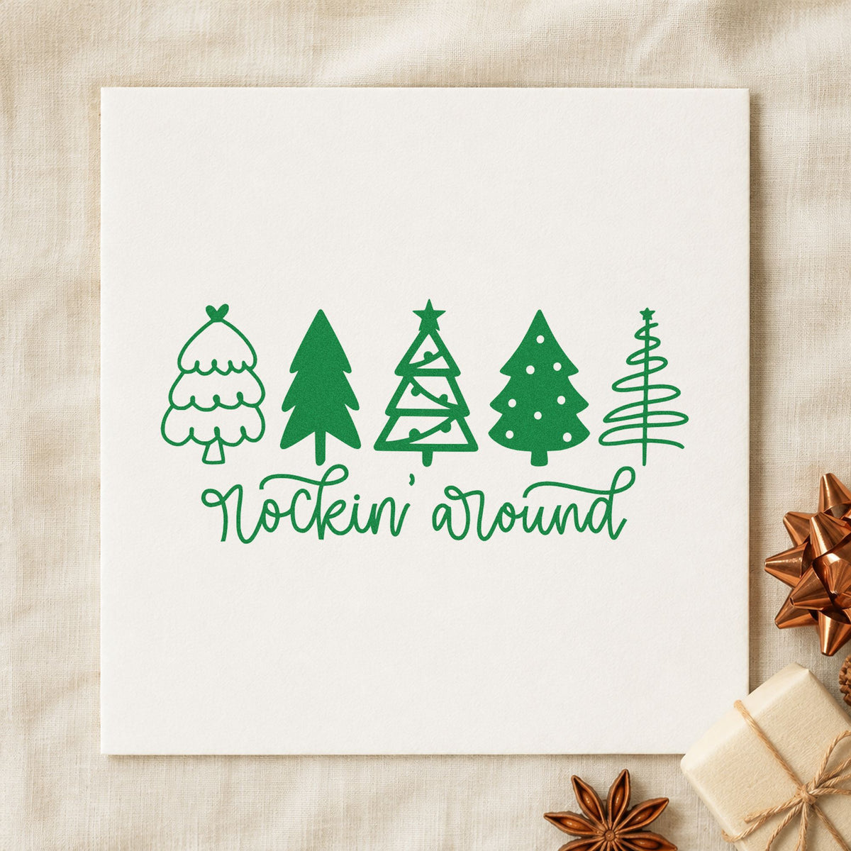 Rockin Around Christmas Trees craft stamp imprint in green ink on a handmade project, one idea being retro party invites.