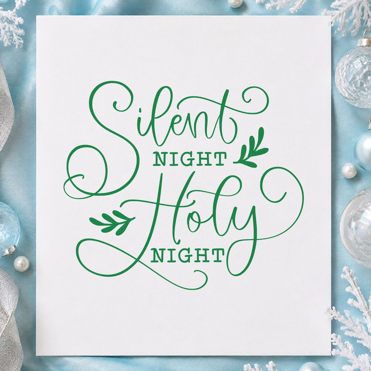Silent Night Holy Night craft stamp imprinted in green ink on paper, a design suited to framed quiet room.