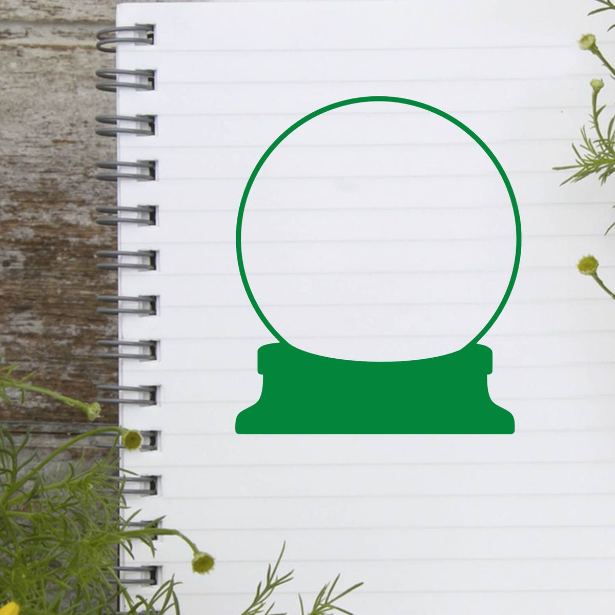 Green circular stamp seal on a white spiral notebook page, with lined paper and rustic wood background.