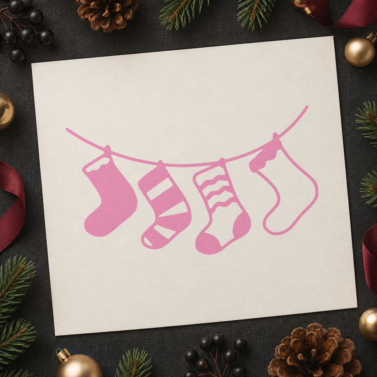 Four Hanging Christmas Stockings craft stamp in purple ink on cardstock, an easy option for mantel album page.