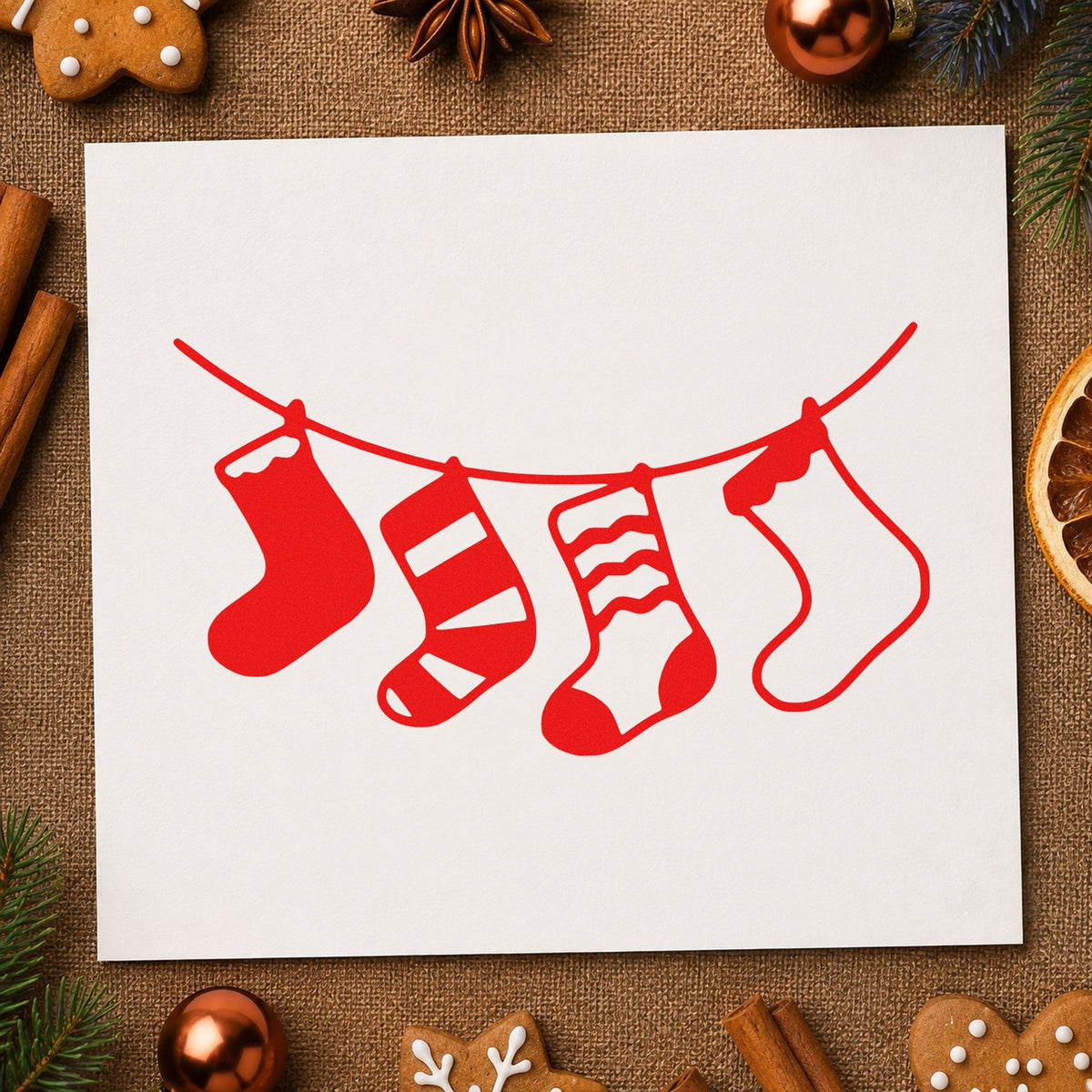Four Hanging Christmas Stockings rubber stamp shown in red ink, stamped for projects such as filler bag labels.