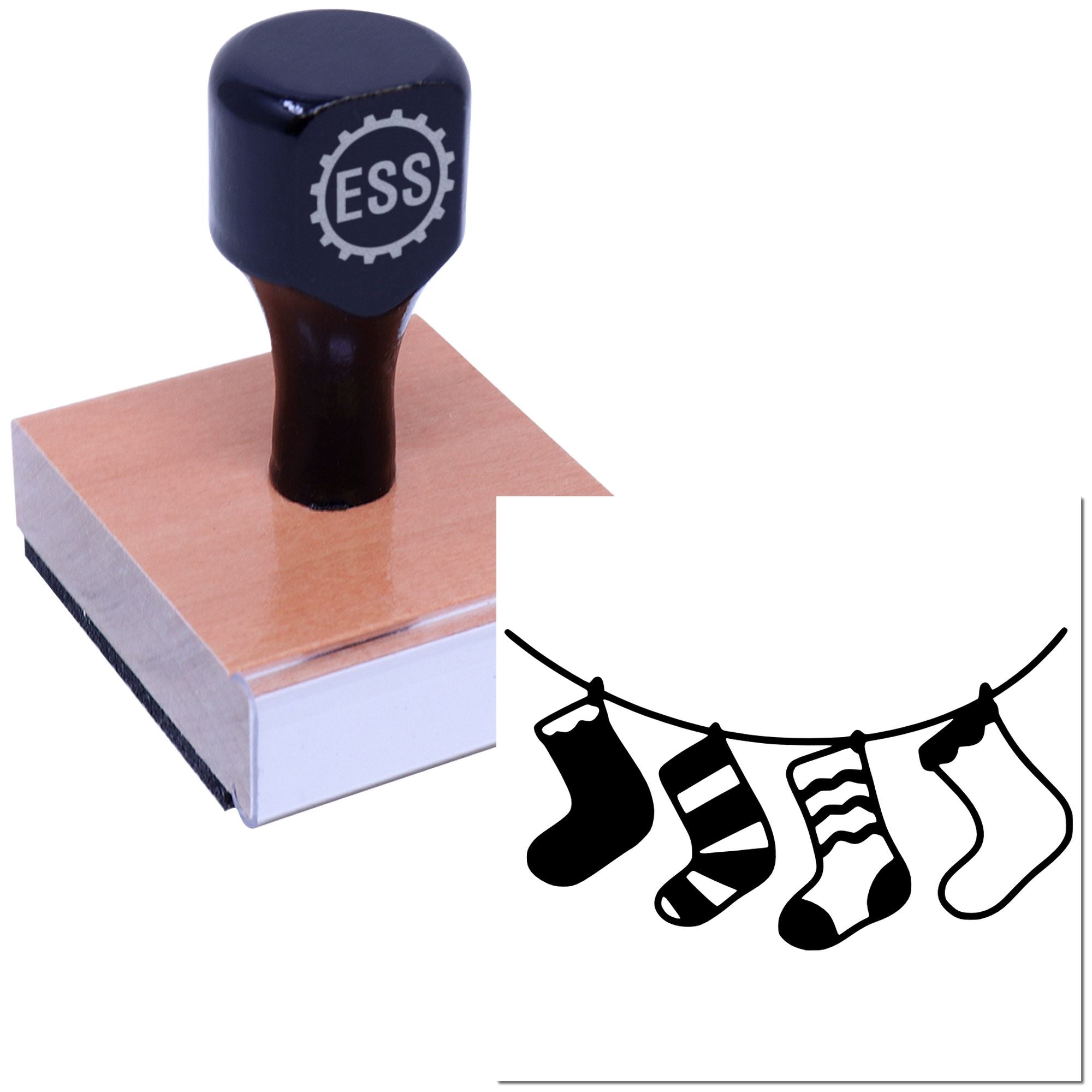 Black ESSI rubber stamp and seal on a wooden block, with hanging sock silhouettes on white.