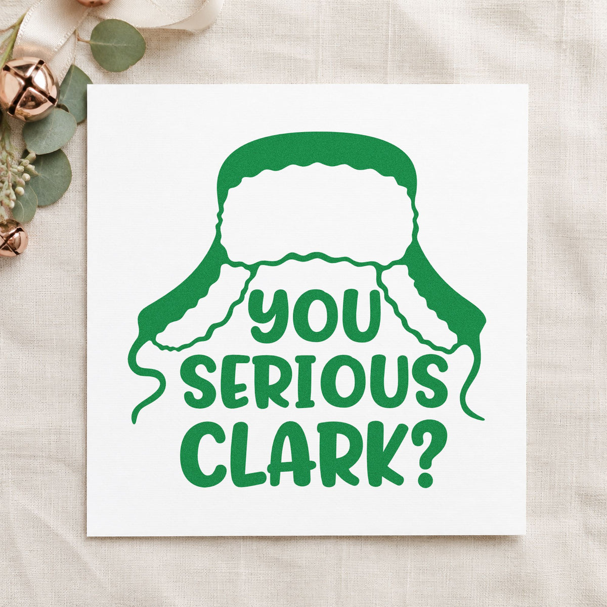 You Serious Clark Winter Hat craft stamp imprint in green ink on a handmade project, one idea being lights contest placards.