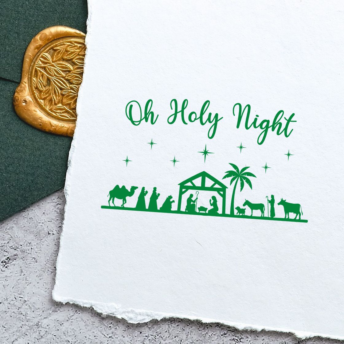 Green Oh Holy Night Christmas stamp with nativity scene on white paper, paired with a gold wax seal.