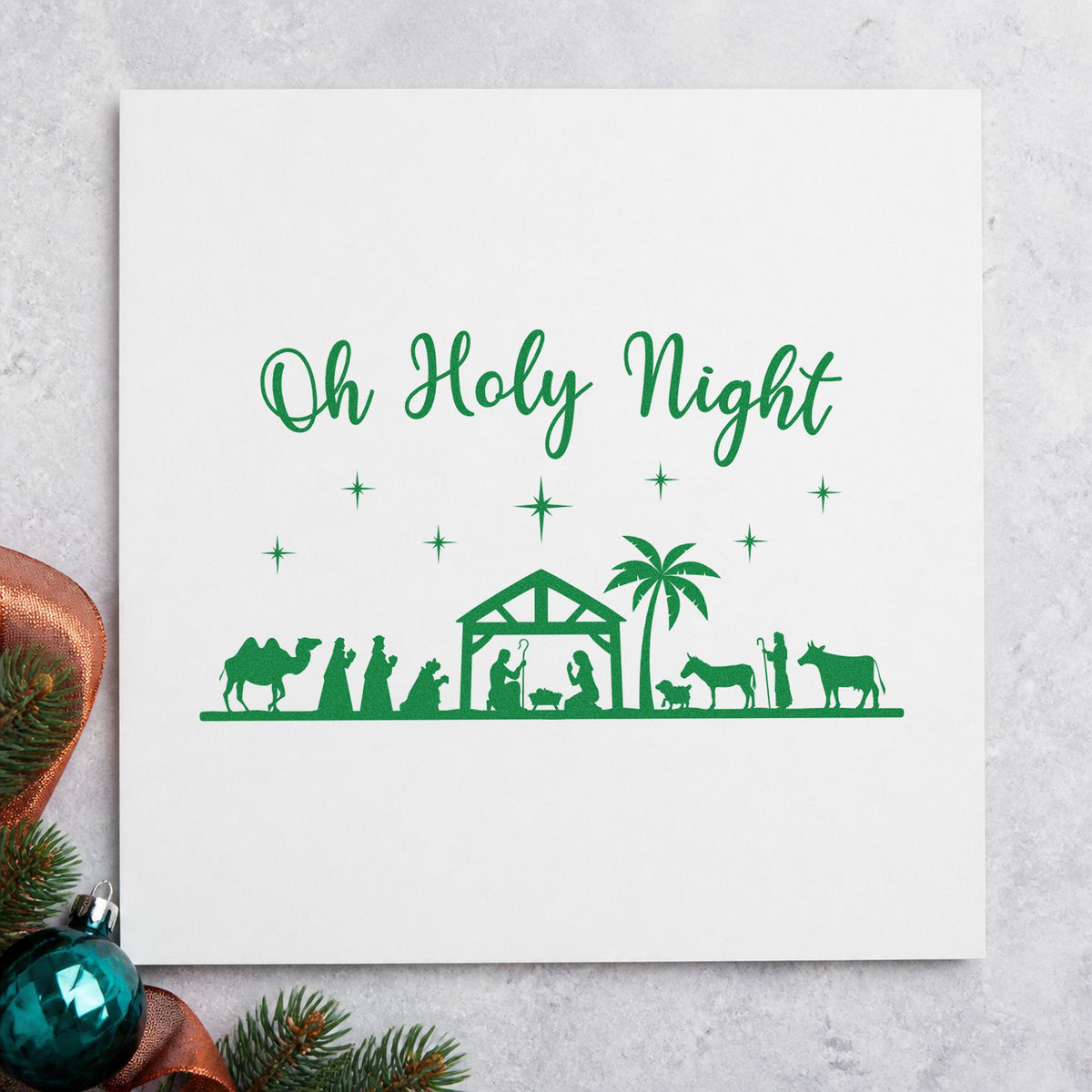 Oh Holy Night Nativity Scene craft stamp imprint in green ink on a handmade project, one idea being storybook gift tags.