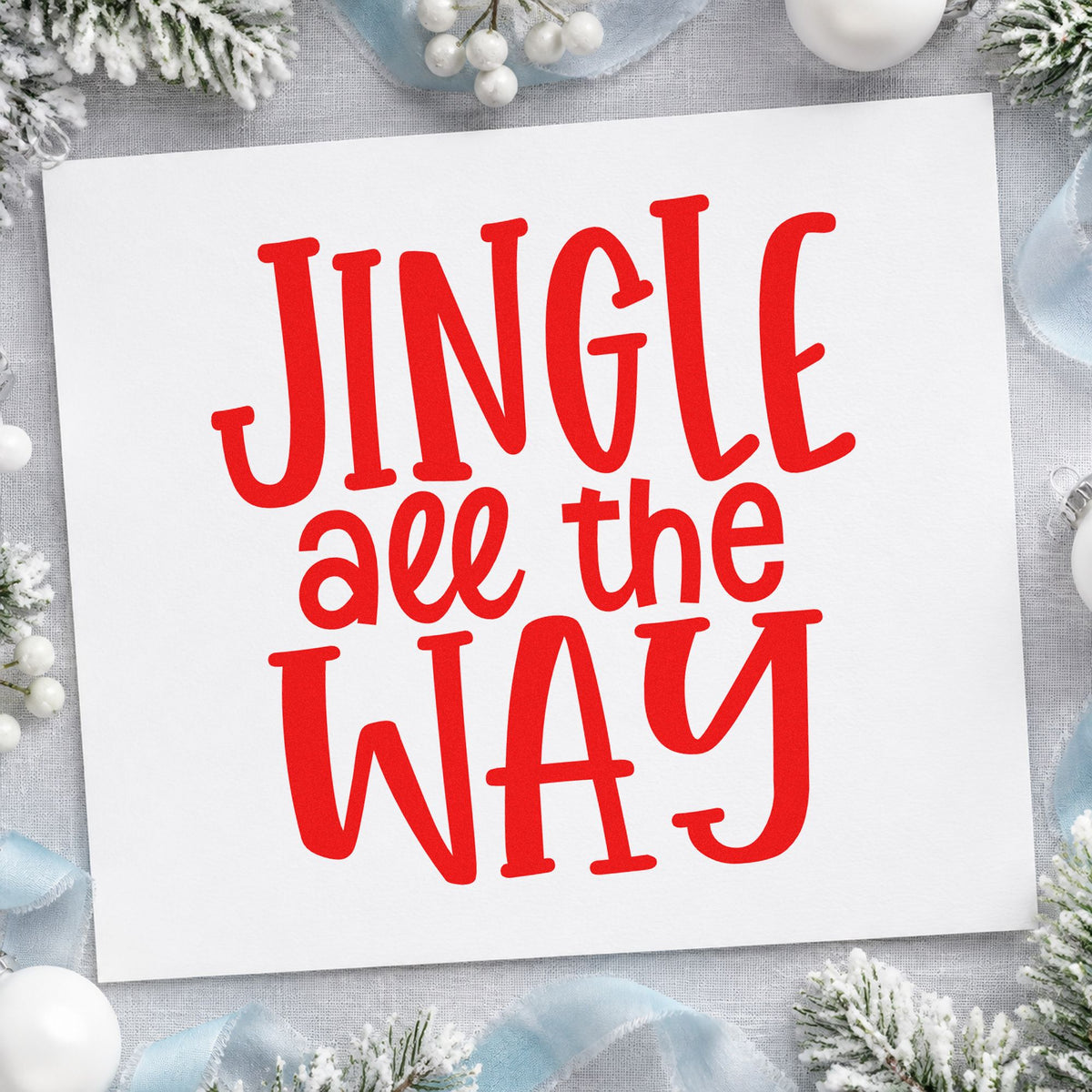 Jingle All The Way craft stamp in red ink on cardstock, an easy option for cushion front printing.