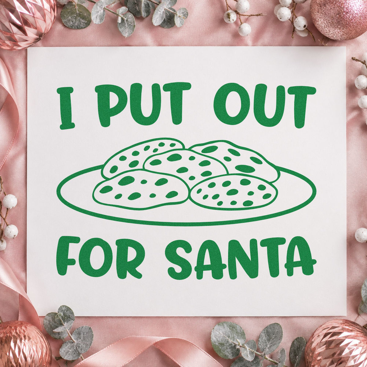I Put Out For Santa Cookies craft stamp imprint in green ink on a handmade project, one idea being bake swap gift tags.
