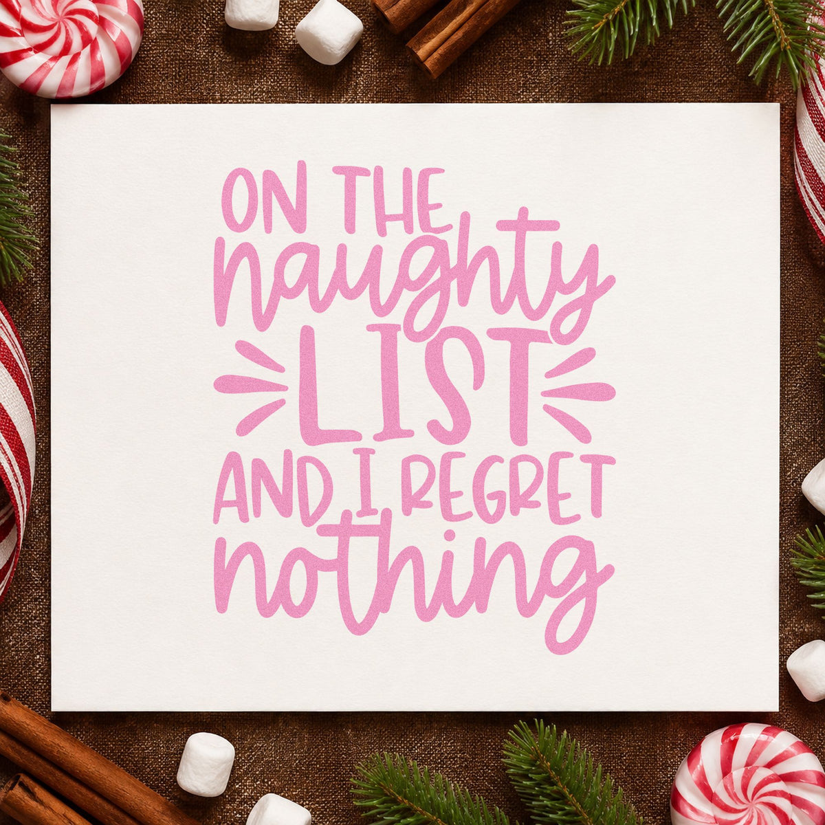 Naughty List Regret Nothing craft stamp in purple ink on cardstock, an easy option for mischief album page.