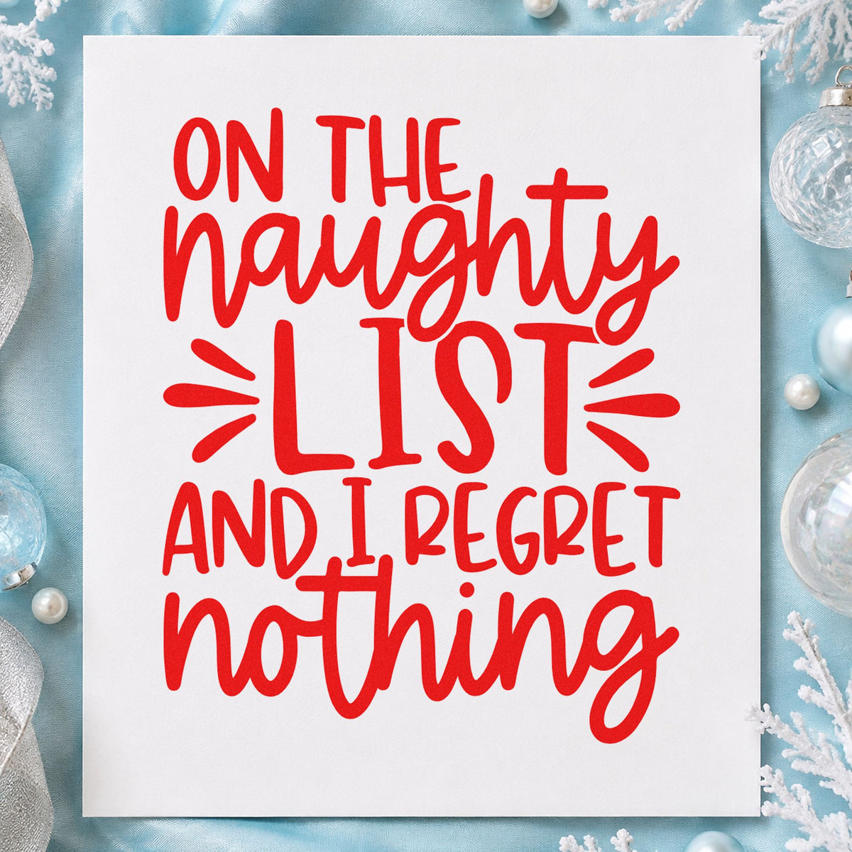 Naughty List Regret Nothing craft stamp in red ink on cardstock, an easy option for party sweater ink.