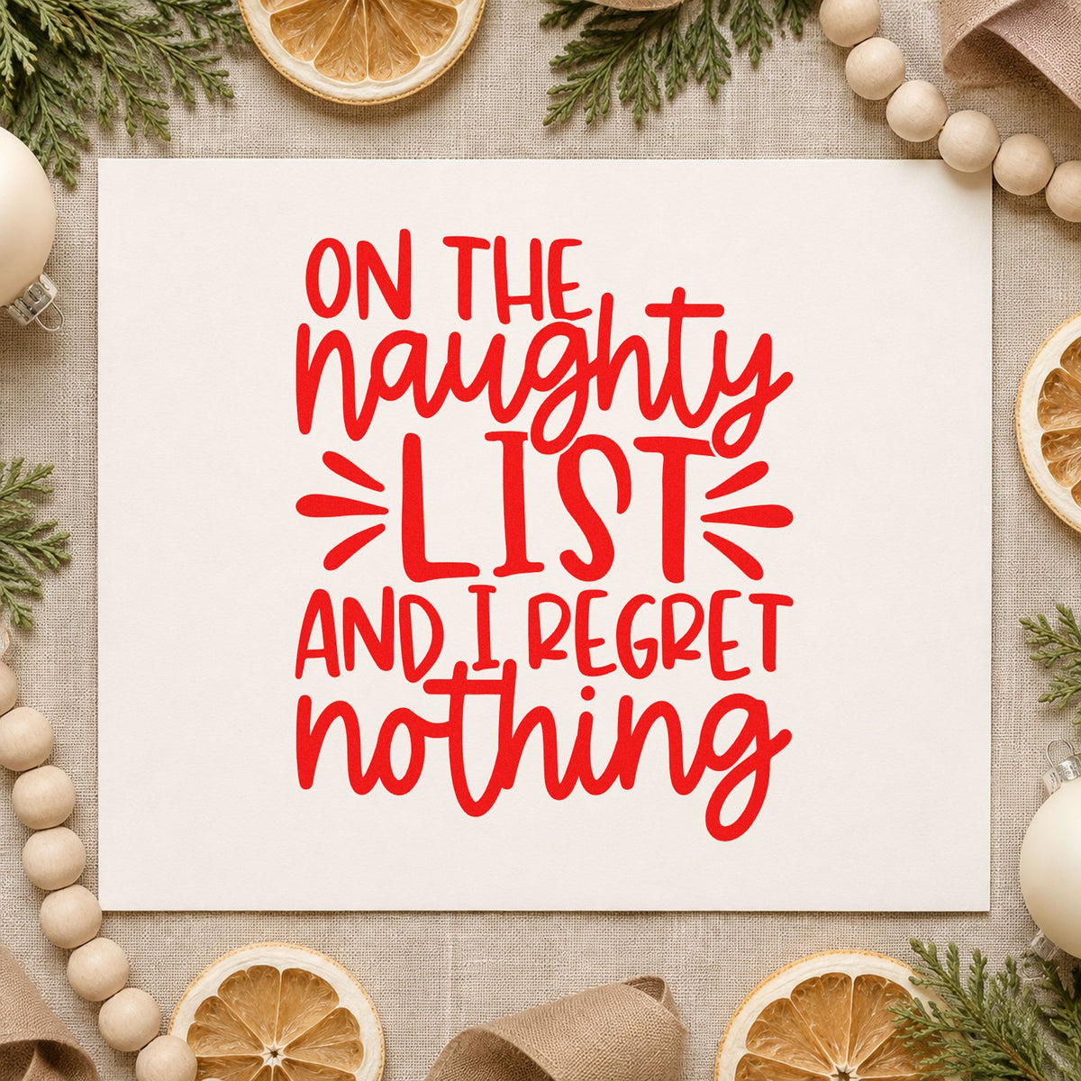 Naughty List Regret Nothing rubber stamp shown in red ink, stamped for projects such as gag box seals.