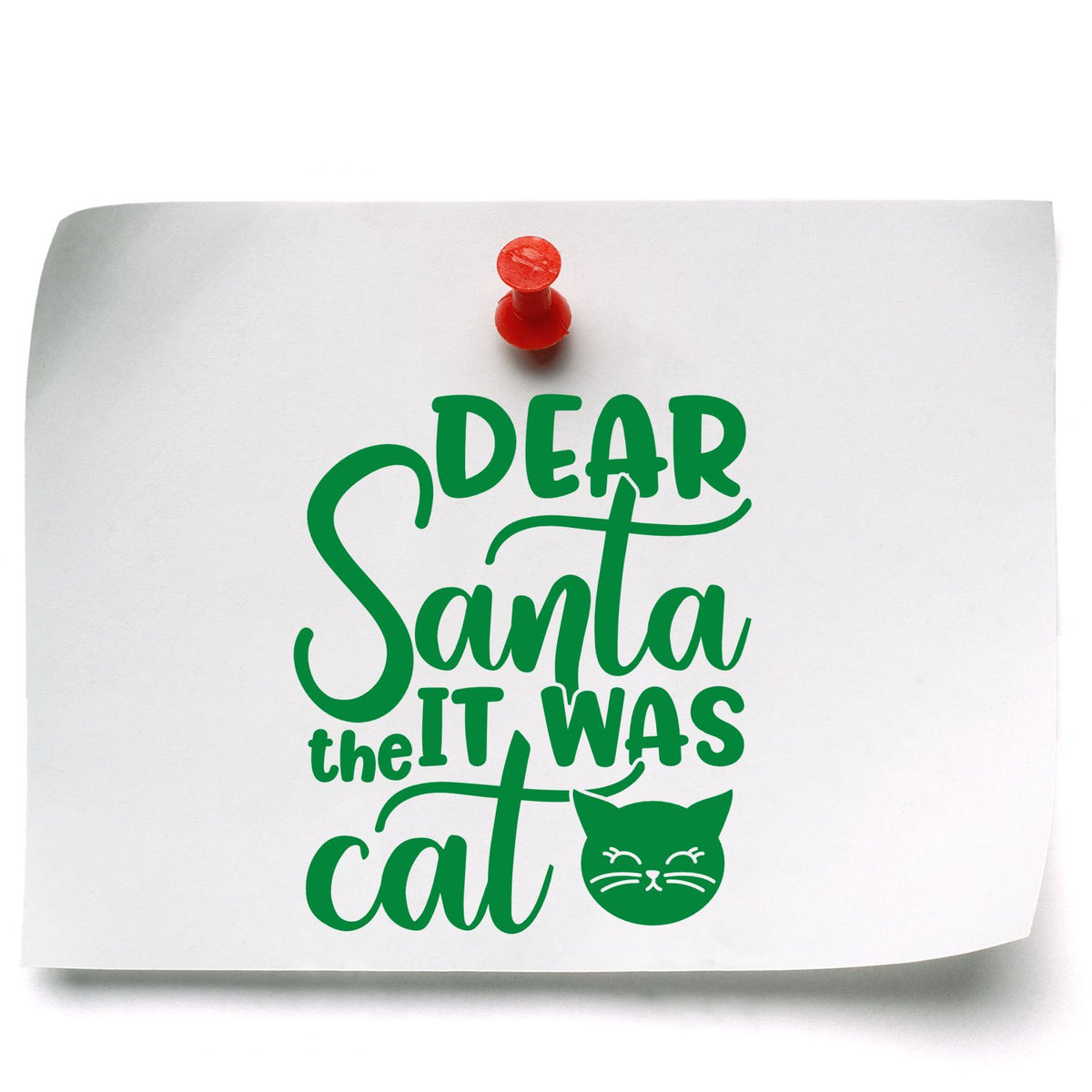 White paper with green Dear Santa it was cat cat-face design and a red stamp seal pin.