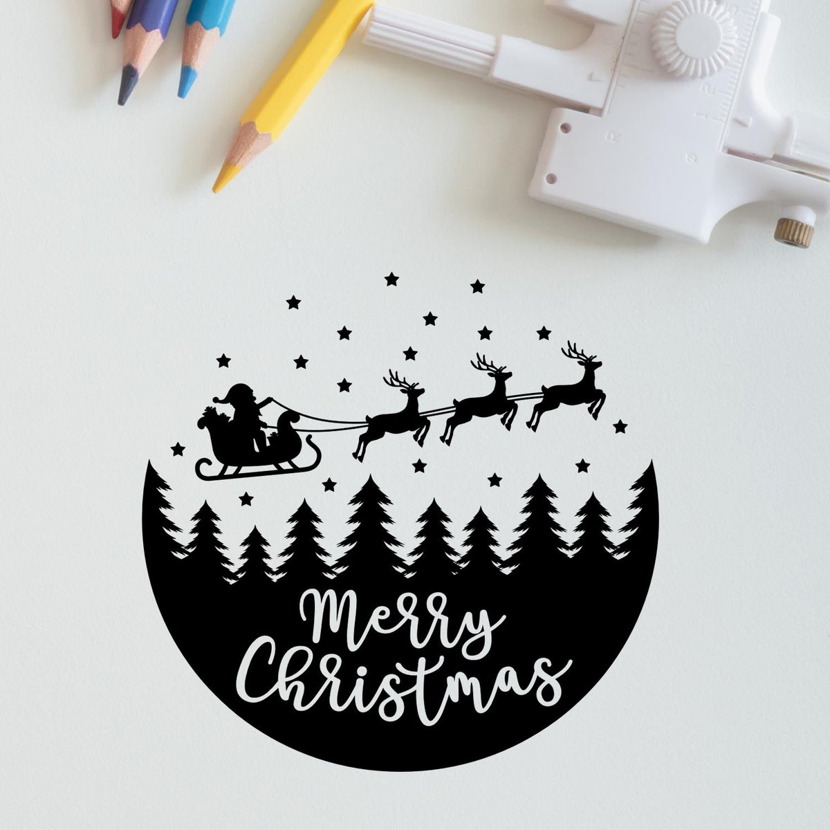 Christmas stamp and seal with black Santa sleigh, reindeer, pine trees, stars, and white Merry Christmas lettering.