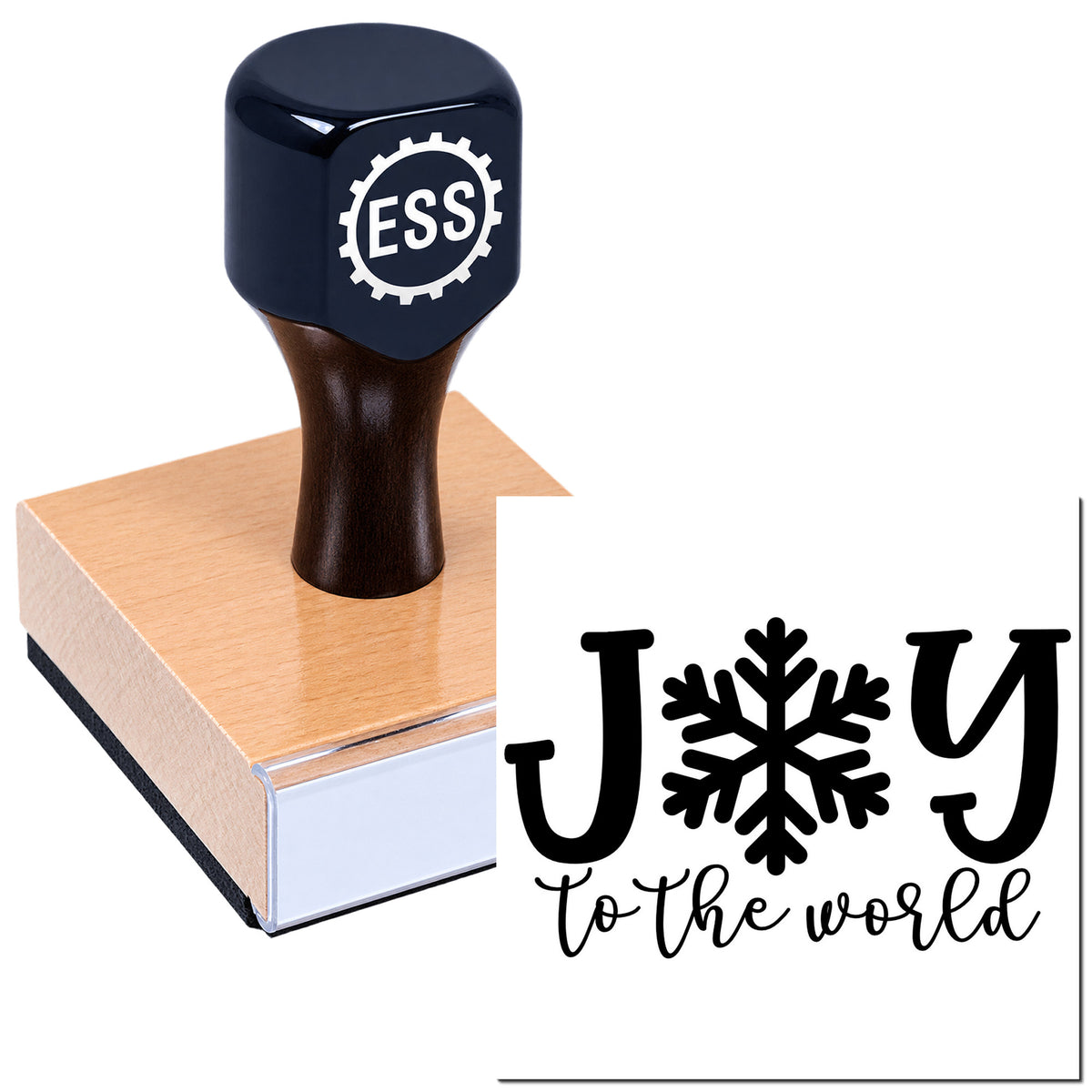 Black ESS rubber stamp on wooden block with custom black "J to the world" snowflake seal on white background.