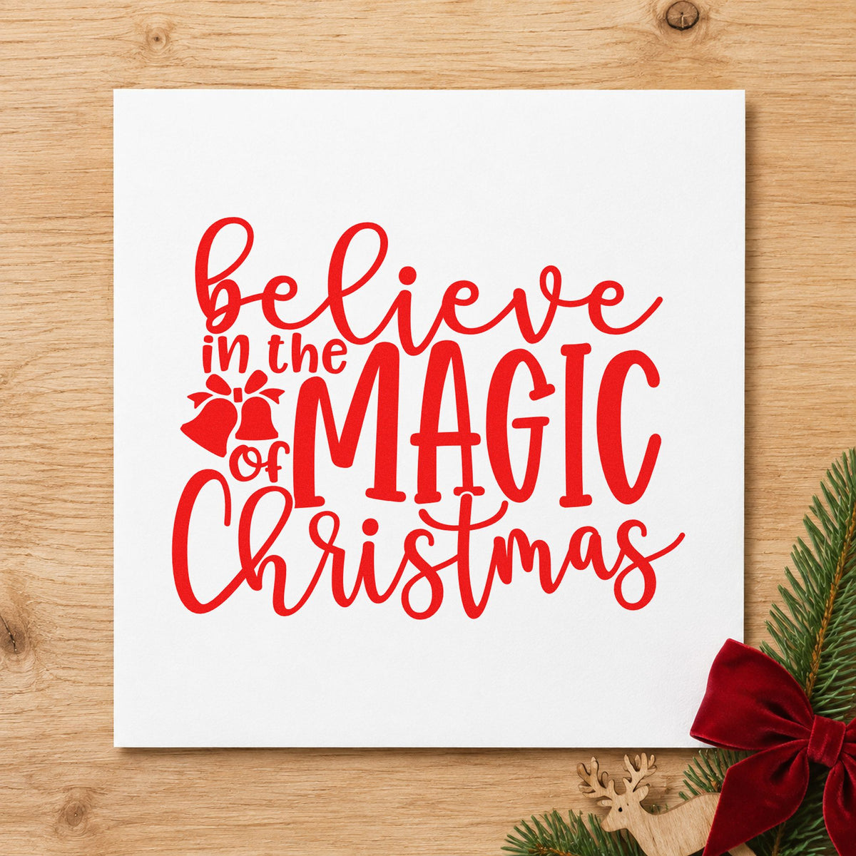 Believe Magic Christmas Holly craft stamp in red ink on cardstock, an easy option for napkin hem printing.