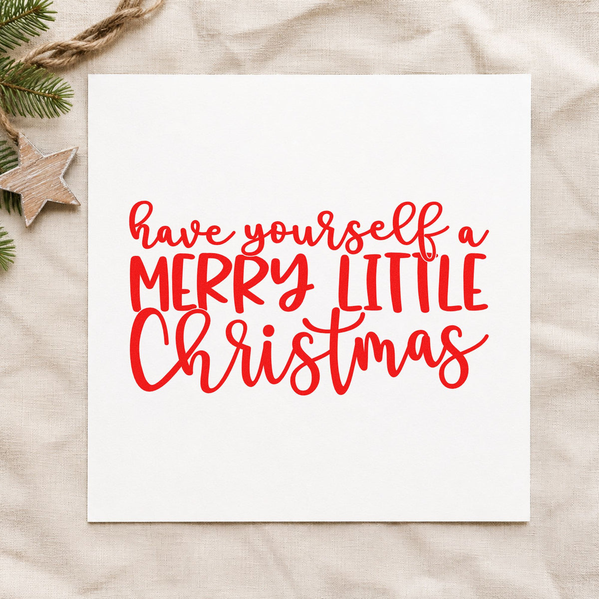 Have Yourself Merry Little Christmas craft stamp in red ink on cardstock, an easy option for armchair throw ink.