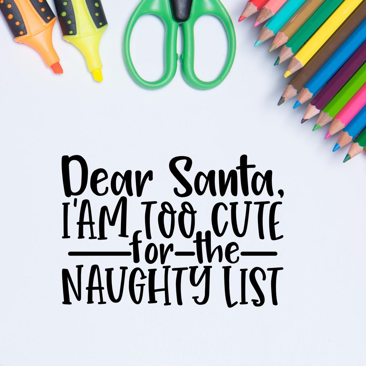 Colorful stamp-and-seal supplies with green scissors, pencils, and Dear Santa, Im too cute for the naughty list text.