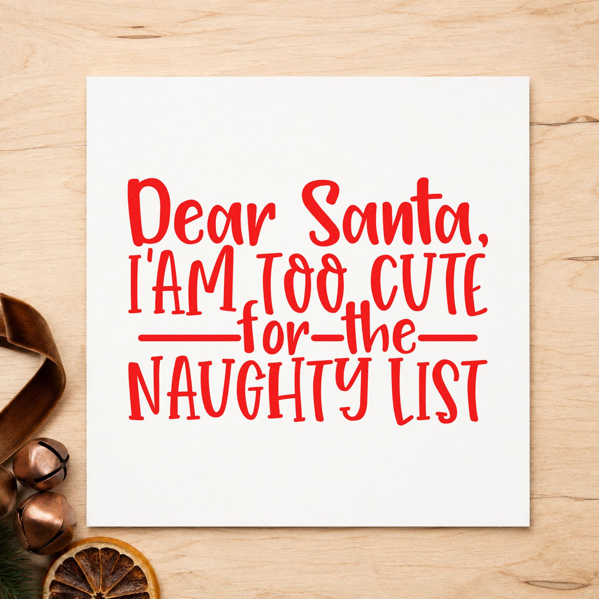 Too Cute For Naughty List craft stamp in red ink on cardstock, an easy option for bib front printing.