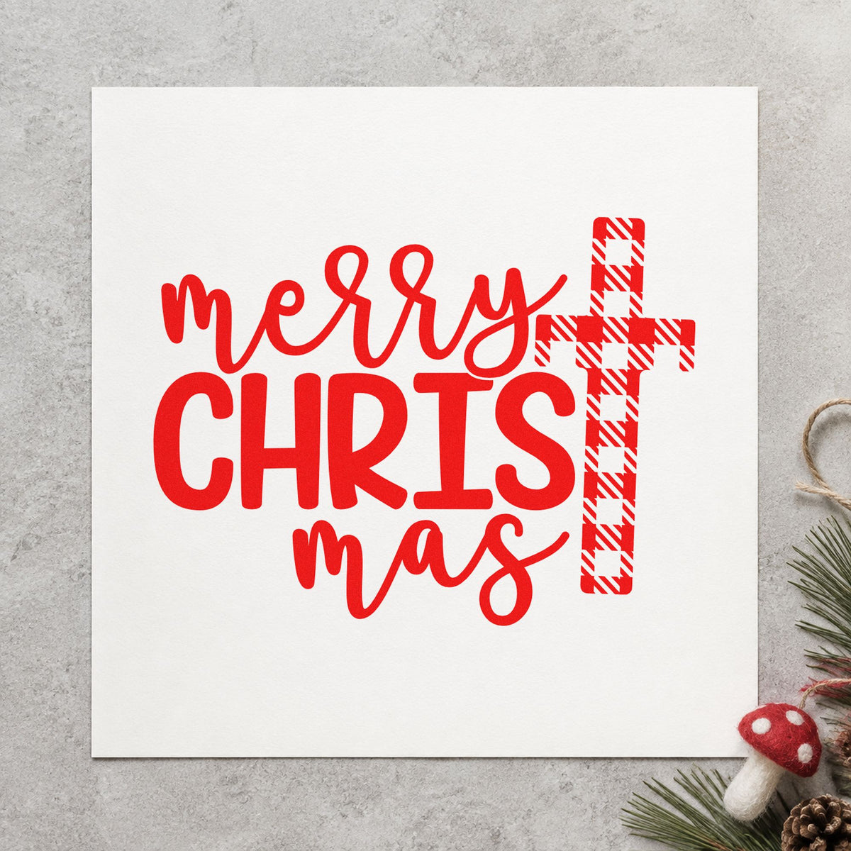 Merry Christmas Plaid Cross craft stamp in red ink on cardstock, an easy option for pew cushion printing.