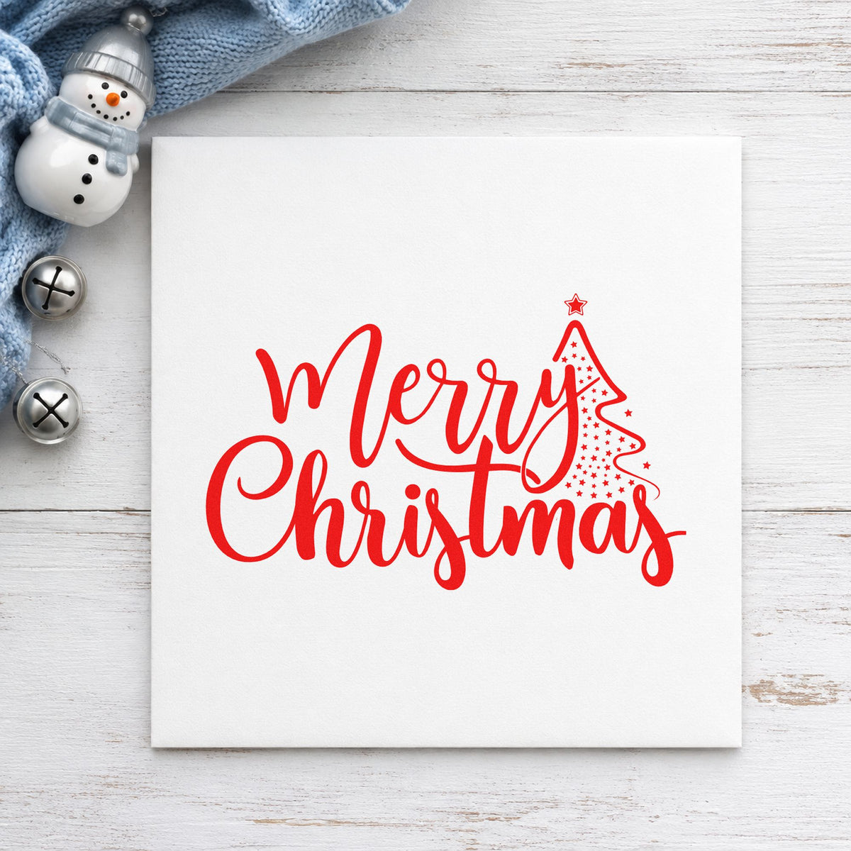 Merry Christmas With Tree craft stamp in red ink on cardstock, an easy option for sleeve seam printing.