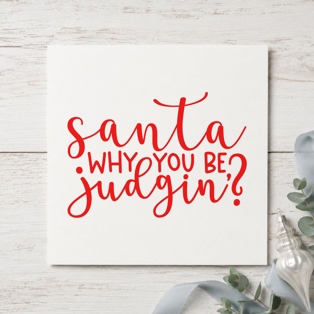 Santa Why You Be Judgin craft stamp in red ink on cardstock, an easy option for hoodie back printing.
