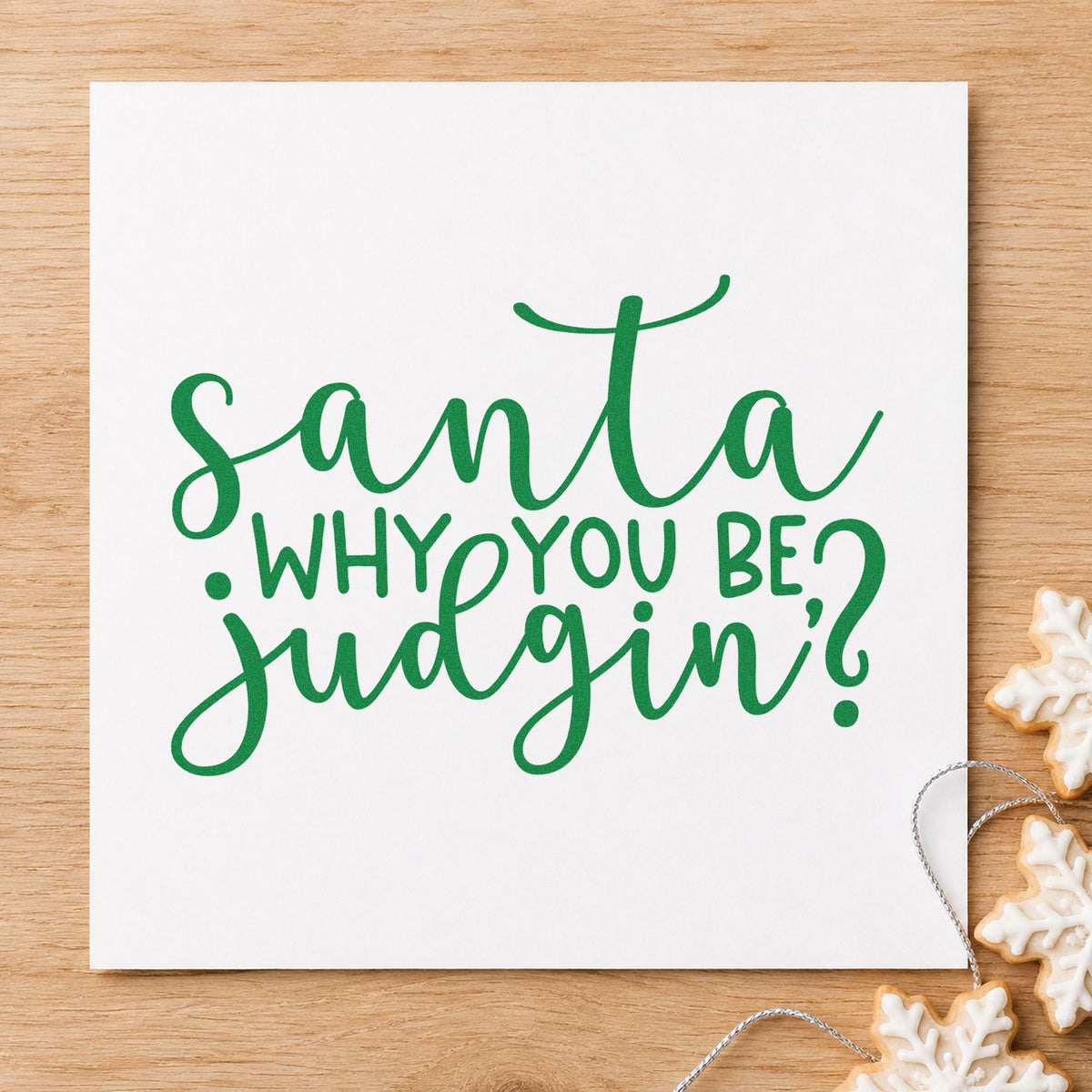 Santa Why You Be Judgin craft stamp imprint in green ink on a handmade project, one idea being party game placards.